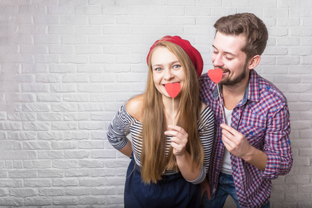 s Day. A man with a beard and a woman with blond long hair. Pape