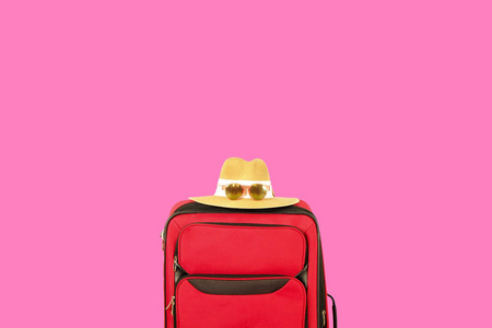 s straw hat, sunglasses. One suitcase prepared for business trip