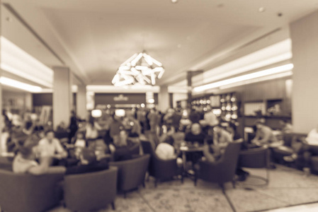 老式色调模糊运动，人们有快乐的时间休闲商务会议在豪华酒店大堂在旧金山加州美国。 模糊抽象背景行业网络事件