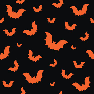 万圣节无缝图案与橙色蝙蝠在黑色背景。 背景壁纸或礼品包装纸的设计。 矢量图。