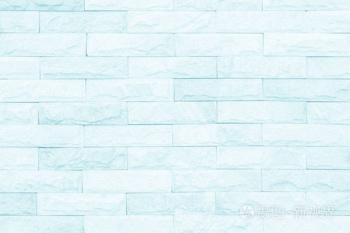 蓝色和白色砖墙纹理背景。 砖或石材地板内部岩石旧图案清洁混凝土网格不均匀砖设计堆叠。