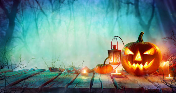  Lanterns And Candles On Table In Misty Night