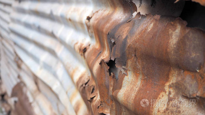 老锌生锈,锌腐烂,镀锌铁板生锈,金属腐蚀,五颜六色的背景.照片-正版商