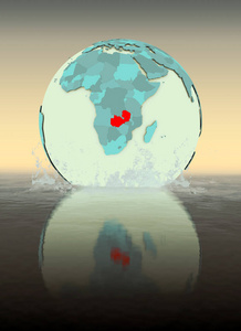 赞比亚在地球仪上溅到水里。 三维插图。