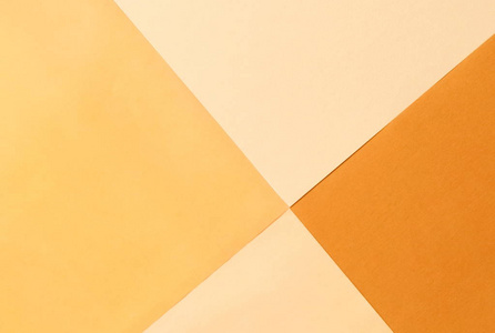 抽象几何纸背景。 淡黄色趋势颜色。背景糊状颜色。 最小的概念。 平躺顶部视图。 复制空间