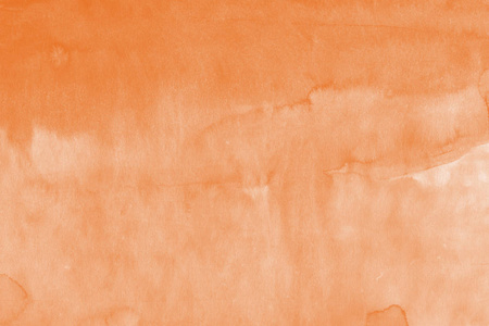 纸张抽象背景上的橙色墨水
