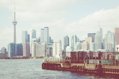 s skyline over lake. Toronto, Ontario, Canada.