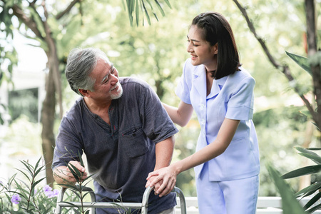 s hand in outdoor garden walking. Senior care, care taker and se