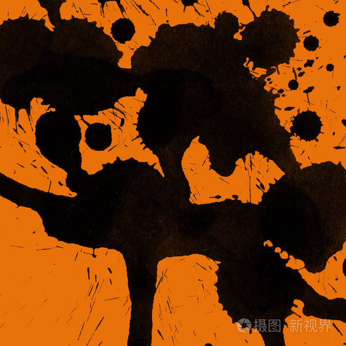 抽象黑色油漆飞溅纹理在橙色背景上