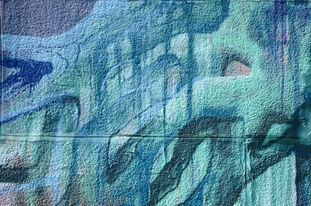 涂鸦图纸的碎片。街道艺术文化风格中用油漆污渍装饰的老墙面..五彩背景纹理..