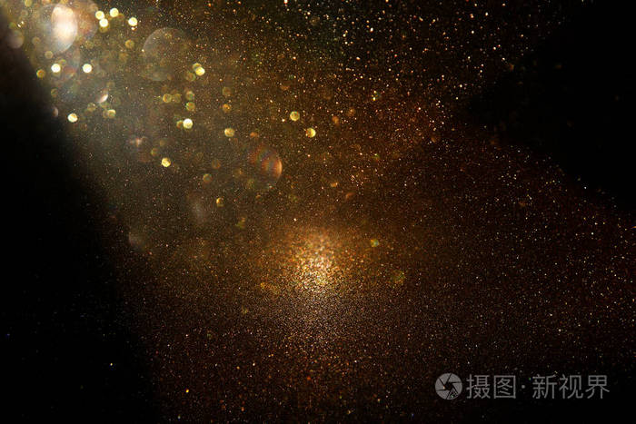 闪闪发光的老式灯光背景黑色和金色重点