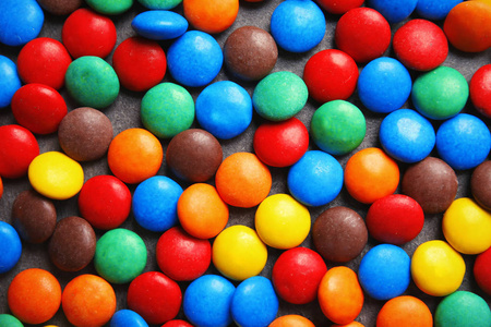 许多五颜六色的糖果作为背景俯视图