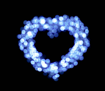 蓝色Bokeh心脏形状背景。