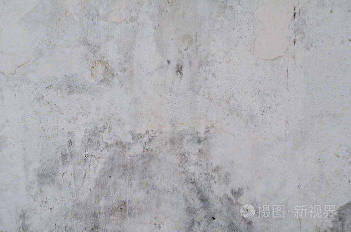 老式水泥墙背景,有裂缝和洞,有多层油漆