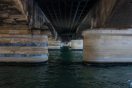 lena and its piers buttresses from below, Seine river, Paris