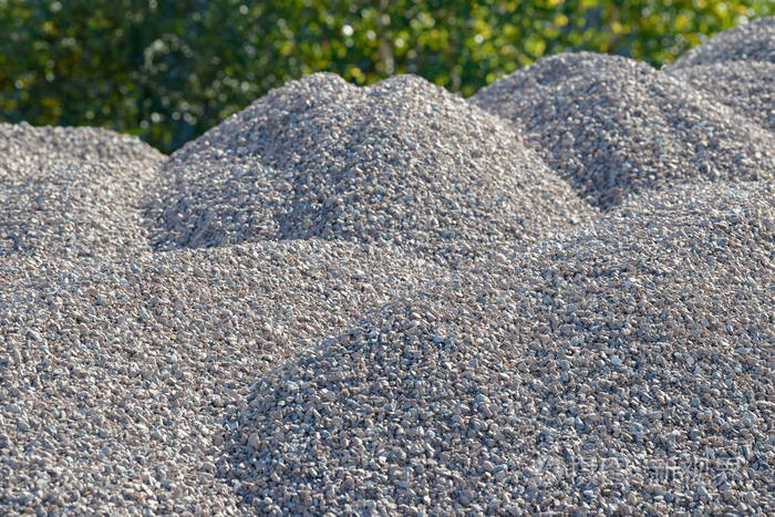 碎石背景道路碎石砾石质地碎石背景成堆的石灰石岩石在施工现场打碎