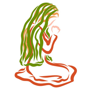 一个头戴头巾的女人跪着祈求上帝照片