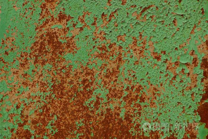 绿色锈墙上的有色金属纹理