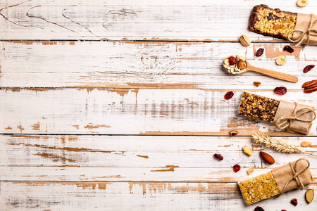  dried fruit, grunged white wood table background. Healthy vegan