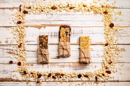  dried fruit, grunged white wood table background. Healthy vegan