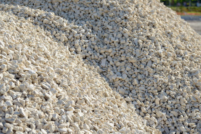 打破的背景道路碎石砾石质地破碎的砾石背景成堆的石灰岩岩石施工现场