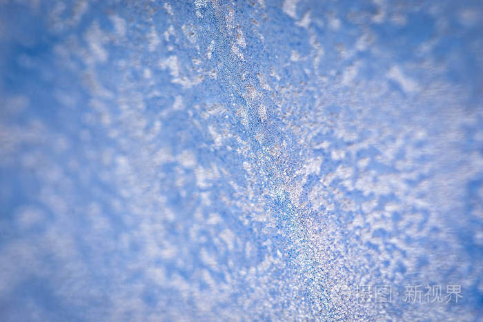 冰冻窗户上的冬天冰纹. 插入文本的纹理背景. 新年主题. 冬天. 冷.