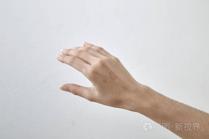 侧观美丽放松的右手女性手掌与中性指甲在白色背景特写演播室拍摄
