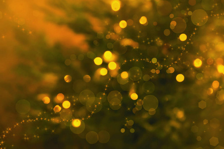 模糊的圣诞节或新年黄色金色背景与波克灯和星星