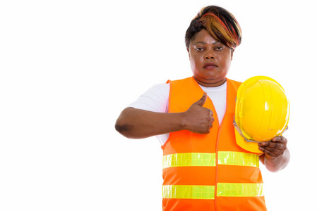 胖工人工作室拍摄的胖黑色非洲女人施工工人 holdi照片