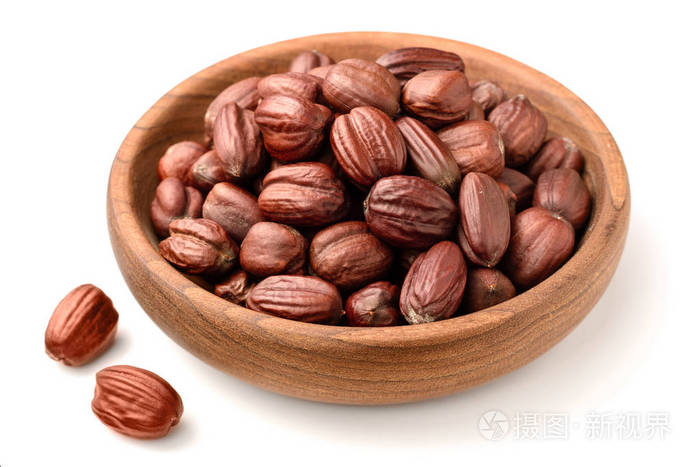 干燥的霍霍巴种子分离在白色