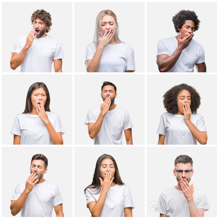 在孤立的背景上无聊地打哈欠,疲惫地用手捂住嘴