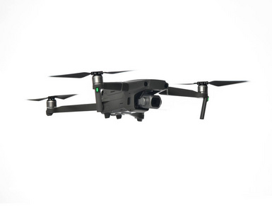 新的深灰色无人机四旋翼与数码相机和传感器飞行查出的白色