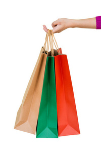 购物妇女拿着袋子孤立在白色背景消费主义销售和人的概念上。