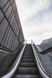  outdoor contemporary moving staircase moving up or down near a 