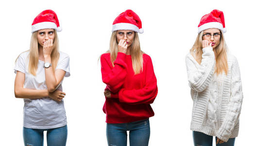 一群年轻漂亮的金发女人戴着圣诞帽，孤立的背景上看起来压力和紧张，双手咬着嘴的指甲。 焦虑问题。