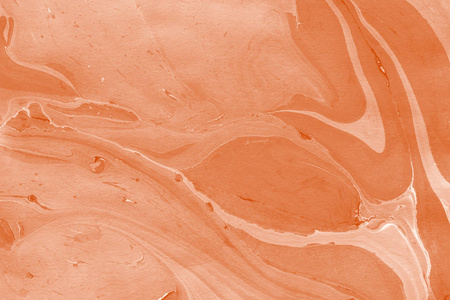 橙色大理石背景与油漆飞溅纹理