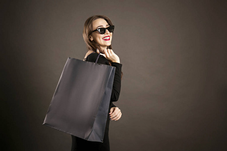  cat eye sunglasses, holding blank shopping bags over black back