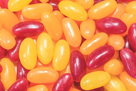 s candy. Multivitamins close up. Yellow Red.