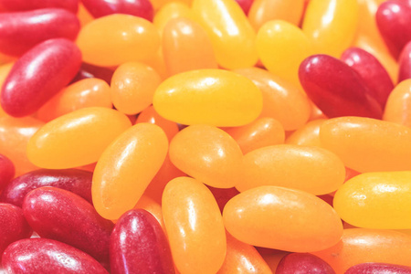 s candy. Multivitamins close up. Yellow Red.