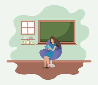 教室与女教师阅读书在沙发上