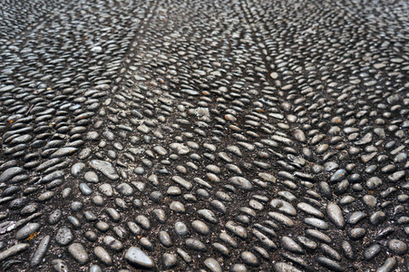 葡萄牙马德拉的富查尔街道上的卵石路面。