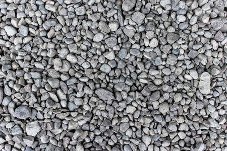 灰色石头的抽象背景。 园艺元素。 有石头的纹理。