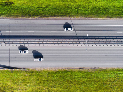 s eye photo of highway. Expressway. Road junctions. Car passing.