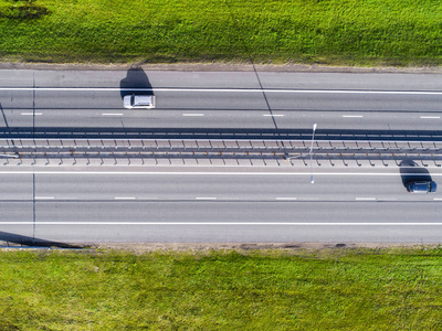 s eye photo of highway. Expressway. Road junctions. Car passing.