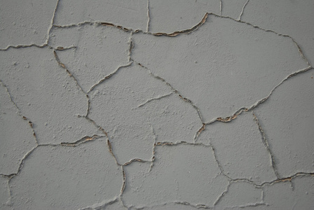 层状灰色墙。 多处修复痕迹。 灰泥水泥