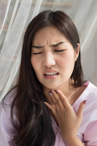  portrait of woman suffering from cold, flu, sickness with sore 