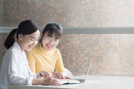  portrait of happy smiling woman students studying in college le