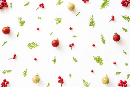 s composition. Top view of spruce branches, pine cones, red berr