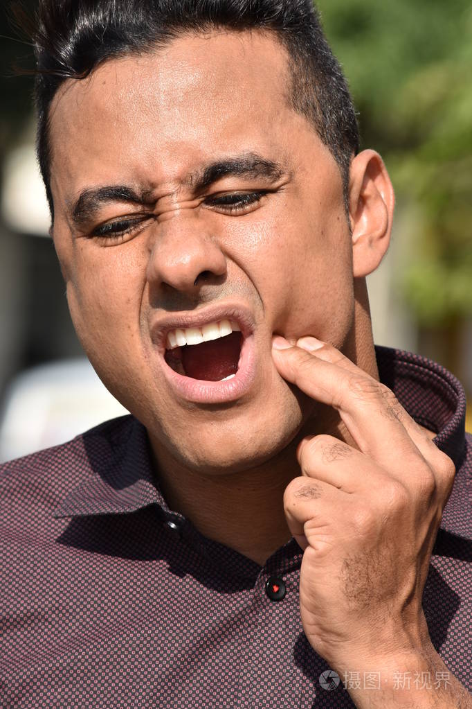 一个牙疼的人照片-正版商用图片13tigf-摄图新视界