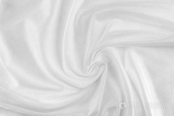 光滑优雅的白色丝绸或缎子豪华布可用作婚礼背景.